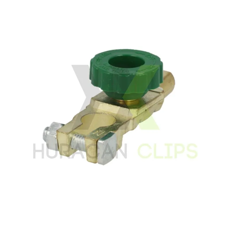 Desconectador de batería para borne negativo con rosca giratoria verde para corte rápido de corriente.